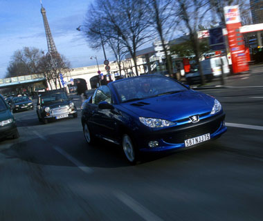 Car, Peugeot 206 CC, Convertible, model year 2000-, blue, open top, driving, City, diagonal from the front, Paris. Image shot 2003. Exact date unknown.