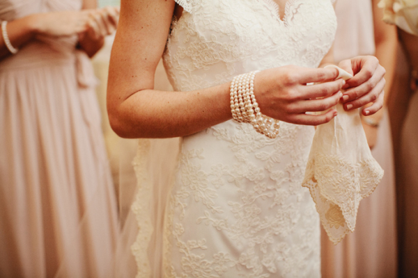 Pearl bracelet worn with a wedding dress