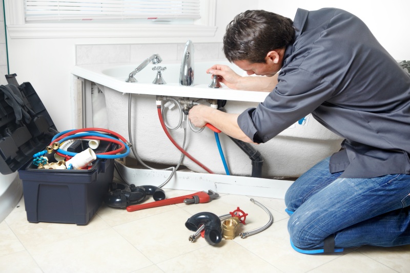 plumbers installing boilers