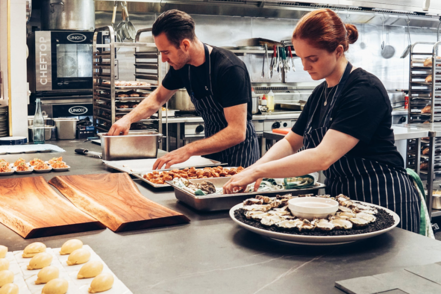 Chefs preparing and plating food